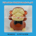 Cute ceramic piggy bank in monkey shape for wholesale